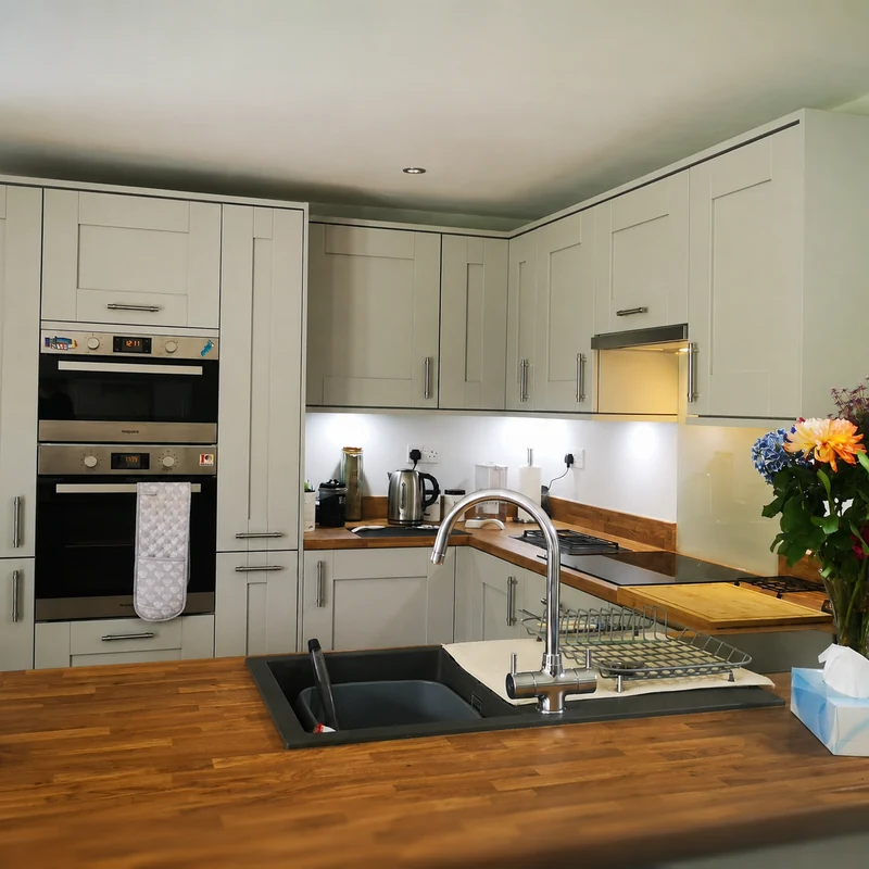 Bespoke fitted kitchen inside a Green Room garden annexe